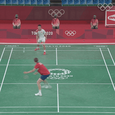 A Badminton Court With Tokyo 2020 On The Floor GIF
