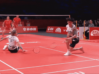 A Badminton Player Wearing A Shirt That Says ' Chen Malaysia ' GIF