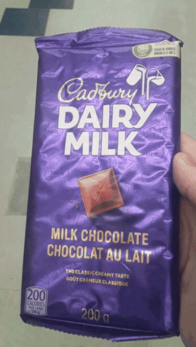 A Bag Of Cadbury Dairy Milk Milk Chocolate GIF