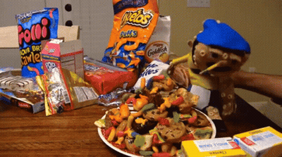 A Bag Of Cheetos Puffs Sits On A Table GIF