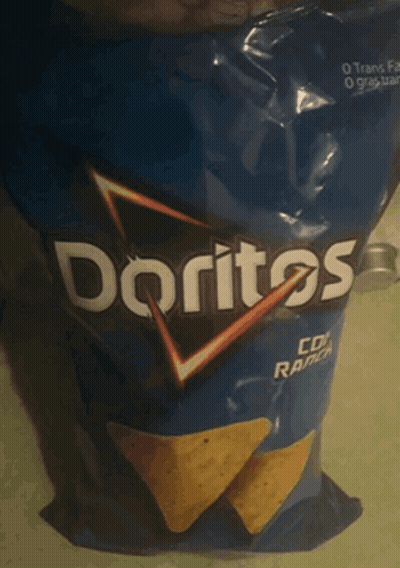 A Bag Of Doritos Corn Ranch Chips Is Sitting On A Table GIF