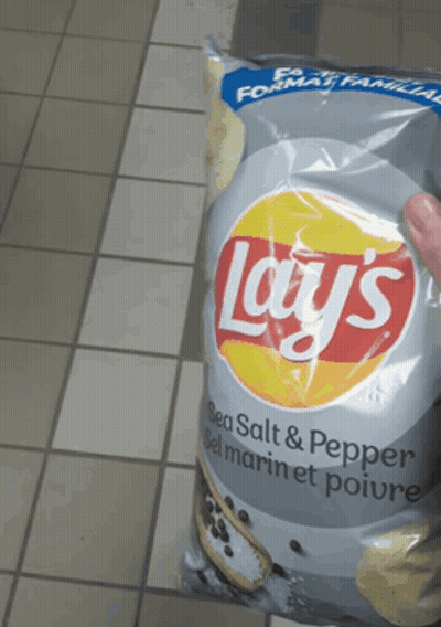 A Bag Of Lay 'S Sea Salt And Pepper Chips GIF