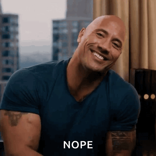 A Bald Man In A Blue Shirt Is Smiling And The Word Nope Is On The Bottom GIF