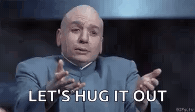 A Bald Man In A Blue Suit Is Making A Funny Face And Says `` Let 'S Hug It Out '' . GIF
