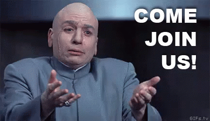 A Bald Man In A Blue Suit Is Pointing At The Words Come Join Us . GIF