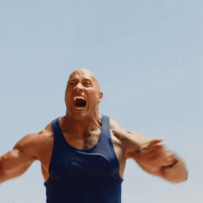 A Bald Man In A Blue Tank Top Is Screaming With His Mouth Open GIF
