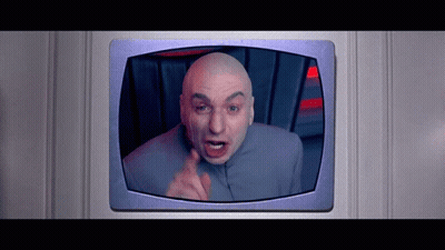 A Bald Man In A Gray Suit Is Giving The Middle Finger GIF