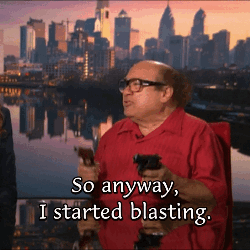 A Bald Man In A Red Shirt Is Holding Two Guns And Says So Anyway I Started Blasting GIF