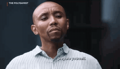 A Bald Man In A Striped Shirt Is Talking To Someone And Says `` Prepare Yourself '' . GIF