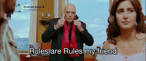 A Bald Man In A Suit And Red Scarf Is Standing Next To A Woman And Says Rules Are Rules My Friend GIF