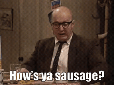A Bald Man In A Suit And Tie Is Asking How 'S Ya Sausage ? GIF