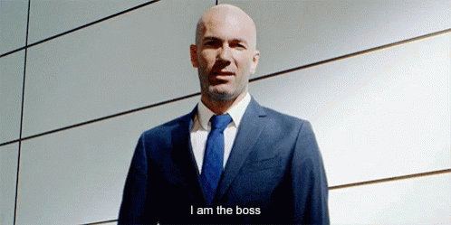 A Bald Man In A Suit And Tie Is Saying I Am The Boss . GIF