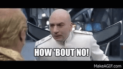 A Bald Man In A White Suit Is Talking To Another Bald Man In A Room . GIF