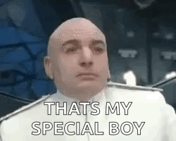 A Bald Man In A White Uniform Is Saying `` Thats My Special Boy '' . GIF