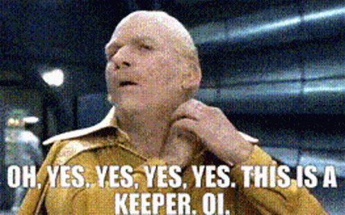 A Bald Man In A Yellow Shirt Says Uh Yes Yes Yes Yes This Is A Keeper Oi GIF