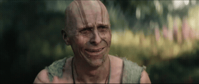 A Bald Man Is Crying With His Eyes Closed GIF