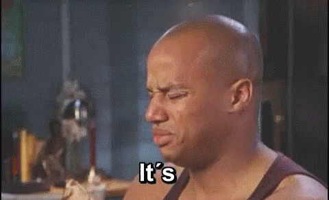 A Bald Man Is Eating A Piece Of Food And Saying `` It 'S So Hot ! '' GIF