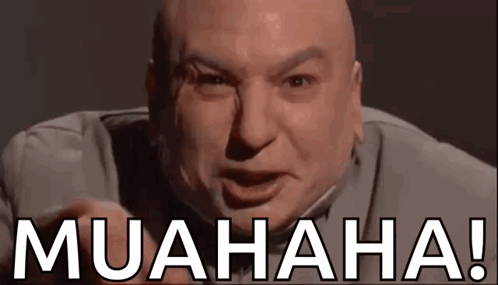A Bald Man Is Making A Funny Face And Pointing At The Camera With The Words Muahaha Written Below Him . GIF