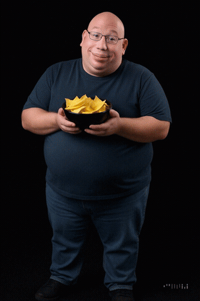 A Bald Man Is Pouring Yellow Liquid Into A Bowl Of Food GIF