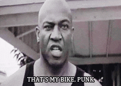 A Bald Man Is Saying " That 'S My Bike Punk " GIF