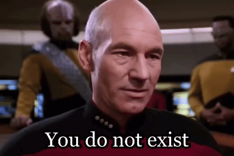 A Bald Man Is Standing In Front Of A Group Of Men And Says You Do Not Exist . GIF