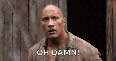 A Bald Man Is Standing In Front Of A Wooden Building And Saying `` Oh Damn ! '' GIF