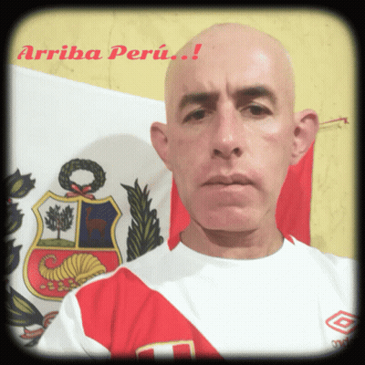 A Bald Man Stands In Front Of A Flag With The Words Arriba Peru GIF