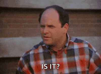 A Bald Man Wearing A Plaid Shirt Is Asking Is It . GIF