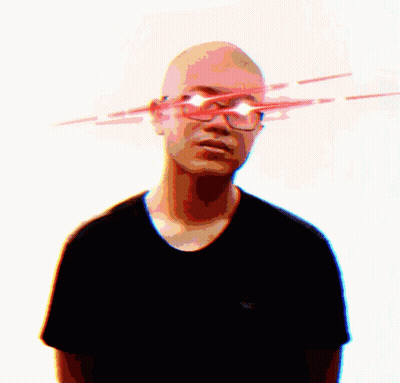 A Bald Man Wearing Glasses And A Black Shirt With A Hollister Logo GIF
