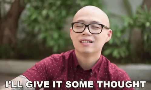 A Bald Man Wearing Glasses And A Maroon Shirt Says I 'Ll Give It Some Thought GIF