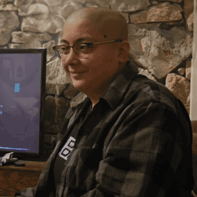A Bald Man Wearing Glasses And A Shirt That Says ' Ao ' On It GIF