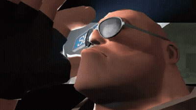 A Bald Man Wearing Glasses Is Looking Up At A Sign That Says 51 GIF