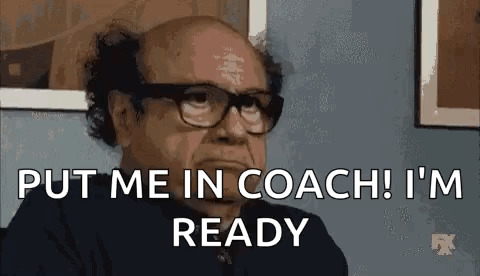 A Bald Man Wearing Glasses Is Sitting In A Chair And Saying `` Put Me In Coach ! I 'M Ready '' GIF