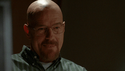 A Bald Man Wearing Glasses Stands In Front Of A Sign That Says Absolutely Not GIF
