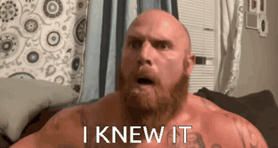 A Bald Man With A Beard Has The Words I Knew It Written On His Chest GIF