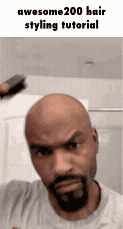 A Bald Man With A Beard Is Brushing His Hair With A Brush And Says Awesome200 Hair Styling Tutorial GIF