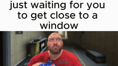 A Bald Man With A Beard Is Holding A Bottle Of Pepsi In Front Of A Window . GIF