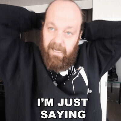 A Bald Man With A Beard Is Holding His Hands Behind His Head And Says I 'M Just Saying GIF