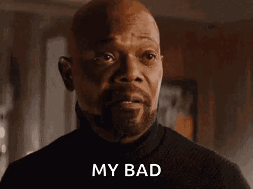 A Bald Man With A Beard Is Looking At The Camera And Saying `` My Bad '' . GIF