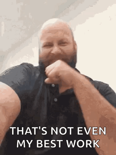 A Bald Man With A Beard Is Making A Funny Face And Saying `` That 'S Not Even My Best Work '' . GIF