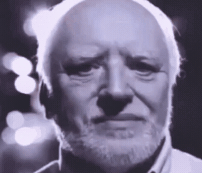 A Bald Man With A Beard Is Making A Sad Face . GIF