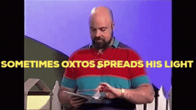 A Bald Man With A Beard Is Reading A Book With The Words Sometimes Oxtos Spreads His Light Above Him GIF