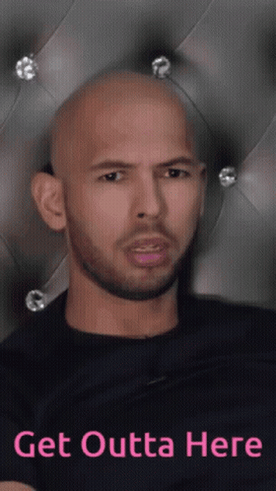 A Bald Man With A Beard Is Sitting In Front Of A Headboard With The Words Get Outta Here On It GIF