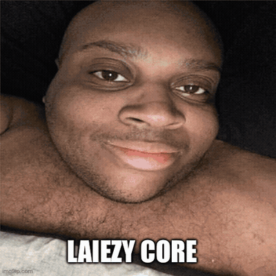 A Bald Man With A Beard Is Smiling With The Words Laiezy Core Below Him GIF