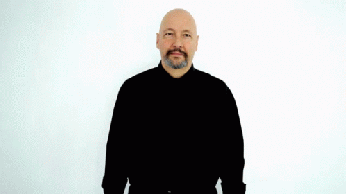 A Bald Man With A Beard Is Wearing A Black Shirt And Giving The Ok Sign GIF