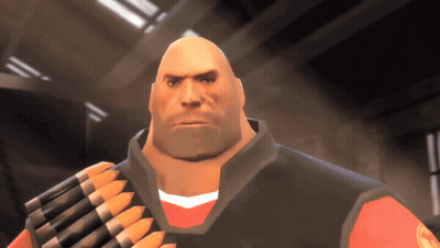 A Bald Man With A Beard Is Wearing A Red Shirt And Holding A Bunch Of Bullets GIF