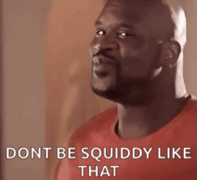 A Bald Man With A Beard Is Wearing A Red Shirt And Says `` Don T Be Squiddy Like That '' . GIF