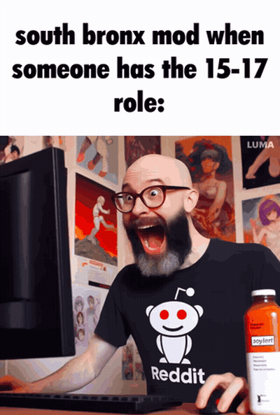 A Bald Man With A Beard Wearing A Reddit Shirt Looks At A Computer Screen GIF