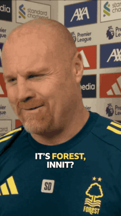 A Bald Man With A Beard Wearing A Shirt That Says Forest GIF