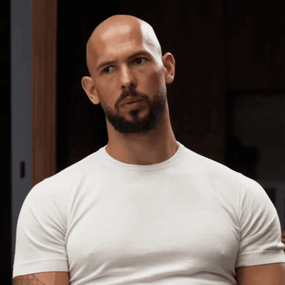 A Bald Man With A Beard Wearing A White T-Shirt GIF